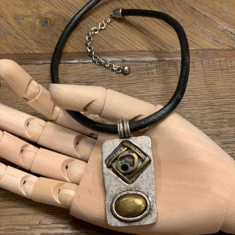 Mixed metal pendant on leather NWOT